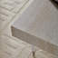 Table basse chic avec motif en faux travertin et pieds en acrylique robustes