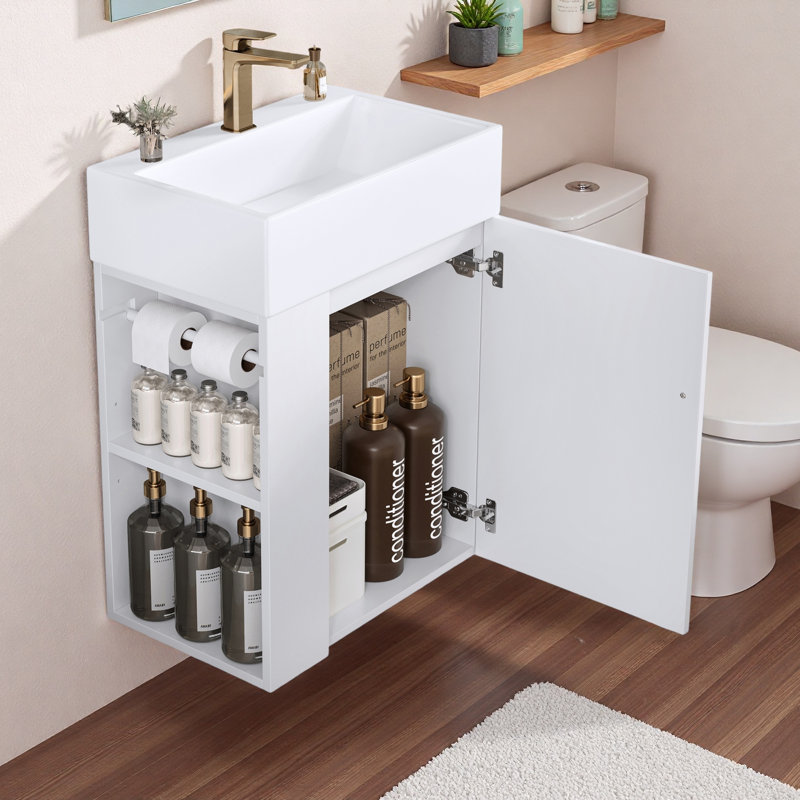 Meuble-lavabo de salle de bain avec lavabo en céramique, porte à motif de losanges, poignée dorée, tablettes de rangement latérales et barre à serviettes intégrée