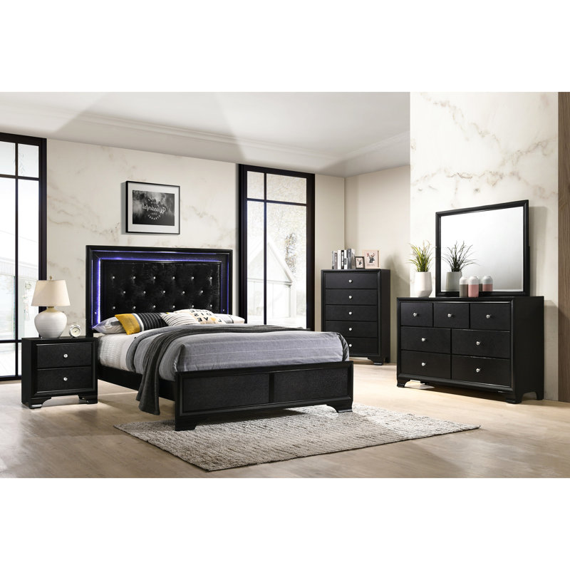 Lit double moderne noir avec tête de lit tapissier et pieds de support en cristal
