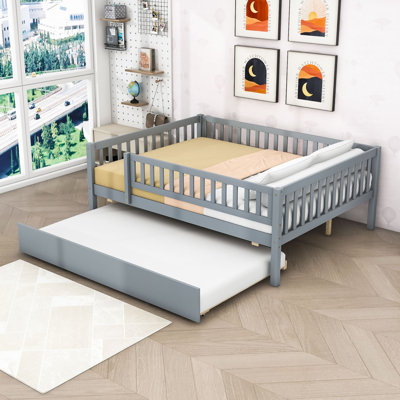 Wooden Daybed with Roll-Out Trundle and Safety Guardrails by Harriet Bee