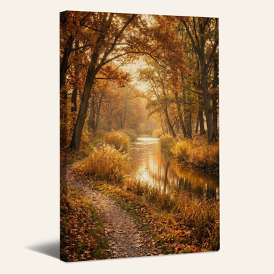 Tableau sur toile représentant un chemin de rivière ensoleillé en automne à travers les arbres