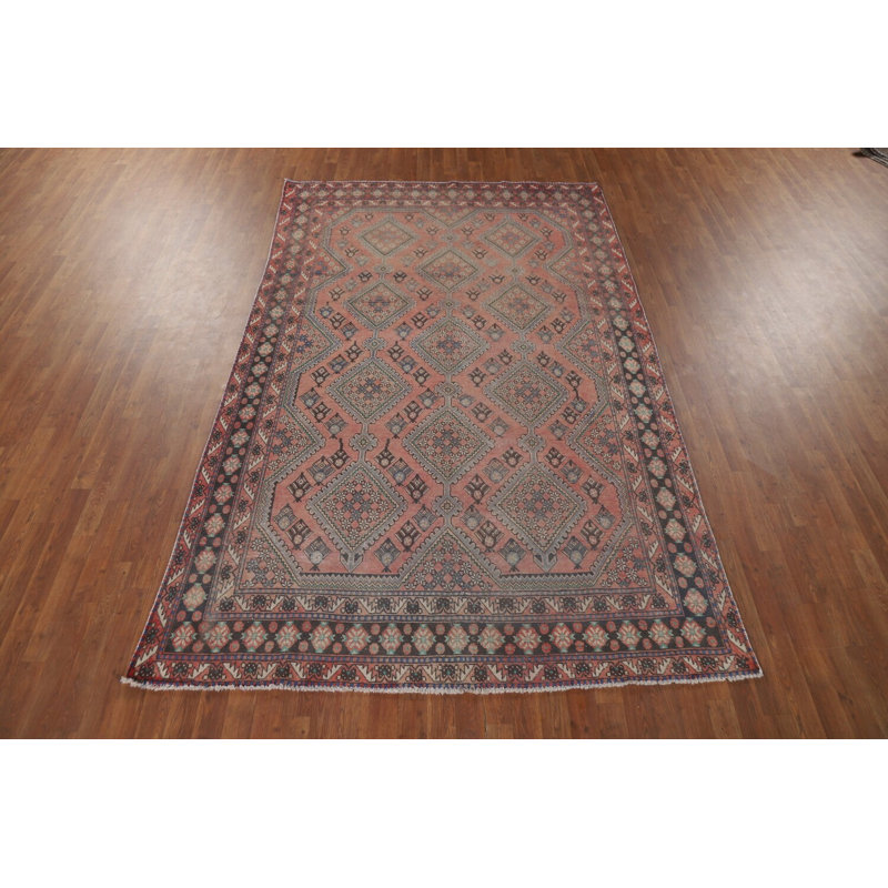 Tapis rose à motif géométrique traditionnel 6 x 10