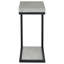 Table élégante en ciment et en-cas au design minimaliste, parfaite pour les espaces de vie modernes et fonctionnels.