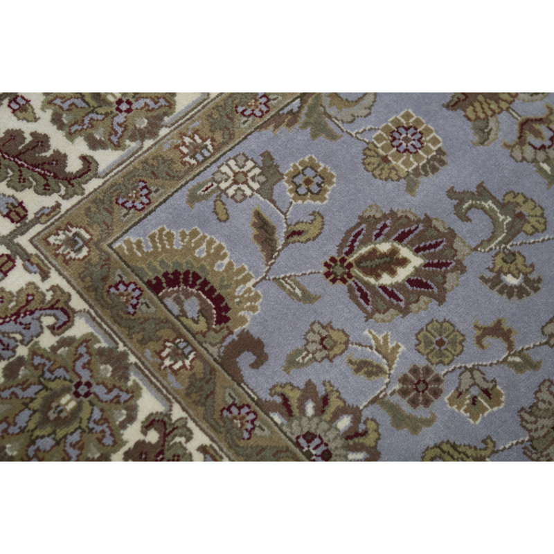 Tapis bleu et ivoire de haute qualité noué à la main