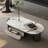 Modern oval stone slab coffee table-485396188