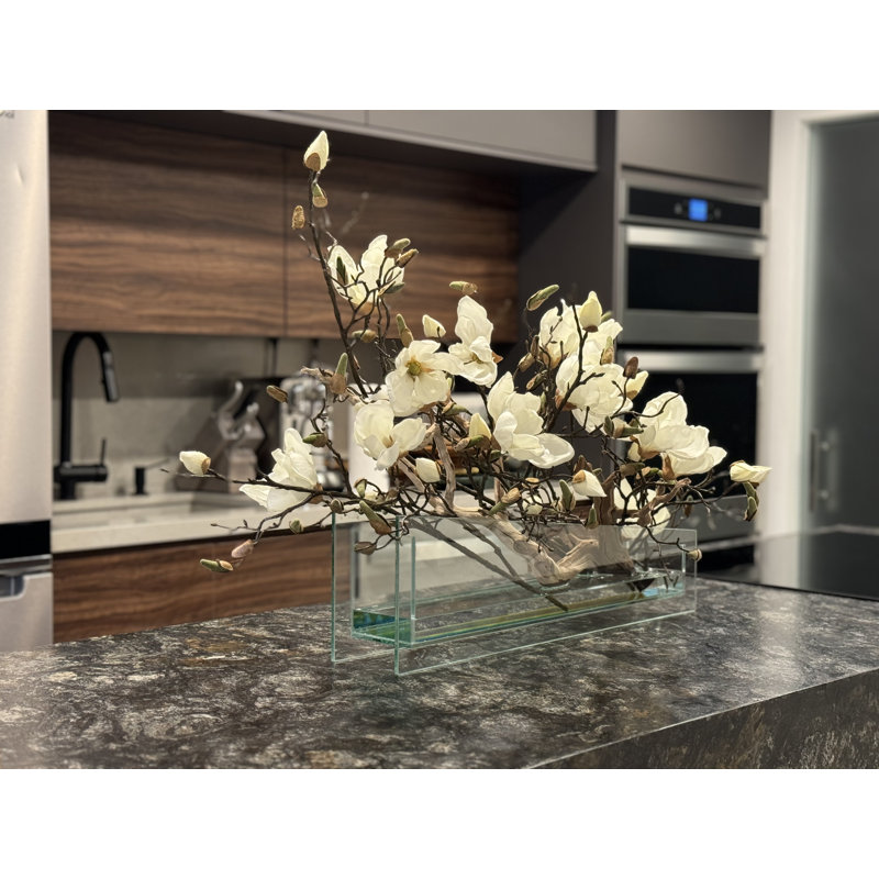 Sloped Glass Planter With White Magnolias