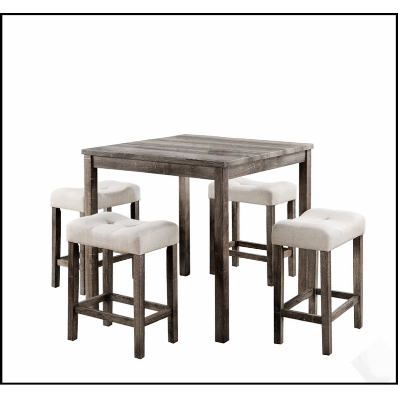 Ensemble table haute de bar cinq pièces avec tabourets capitonnés pour des repas élégants et des réceptions conviviales à la maison