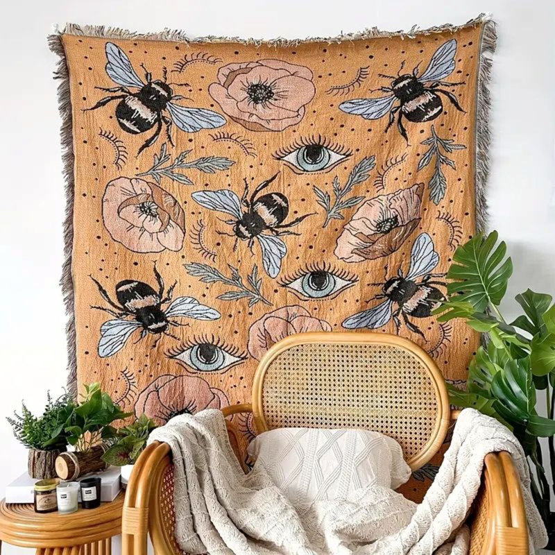 Couverture tissée d'inspiration bohémienne pour lits de bout et siestes. Motif rétro lavable à la machine.