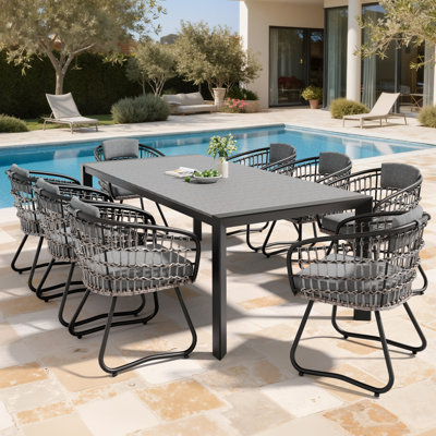 Ensemble repas pour 8 personnes en aluminium avec chaises en rotin et trou pour parasol