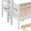 Lit superposé simple au-dessus d'un lit double avec lit gigogne en bois