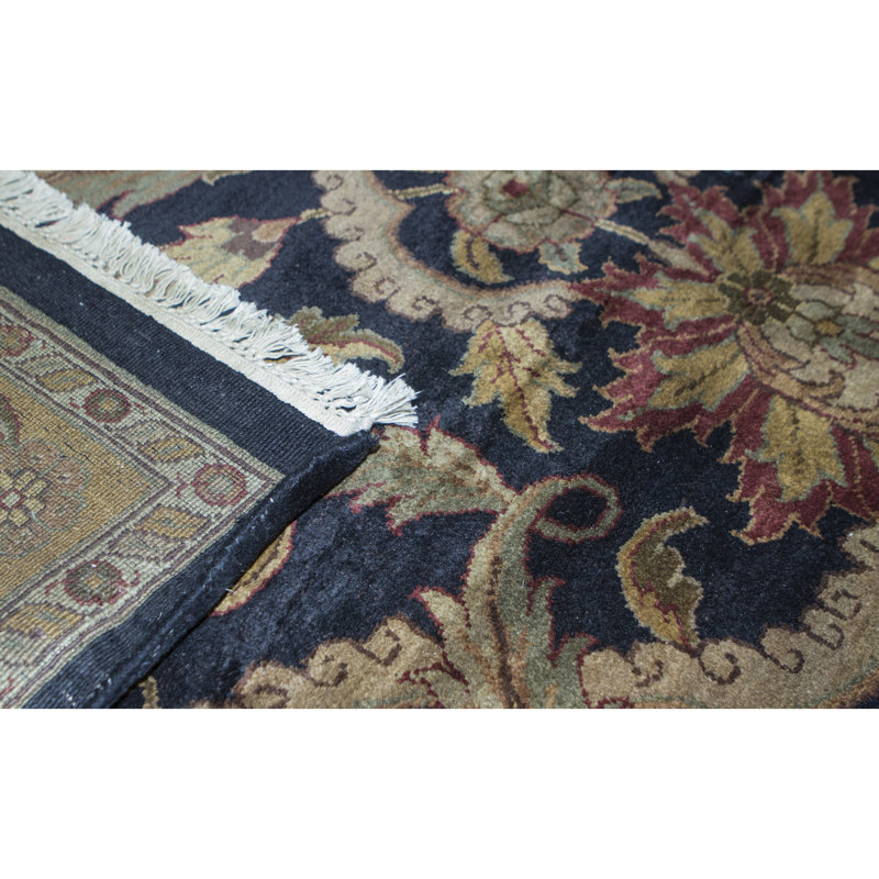 Tapis noir et doré de haute qualité noué à la main