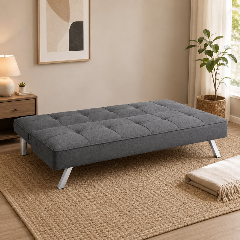 Canapé-lit pliant en tissu gris pour la maison - un style polyvalent pour le salon qui bascule facilement d'un canapé à un lit.