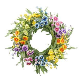 Couronne de fleurs sauvages printanières arc-en-ciel