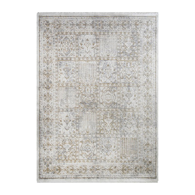 Tapis oriental ivoire délavé avec frange