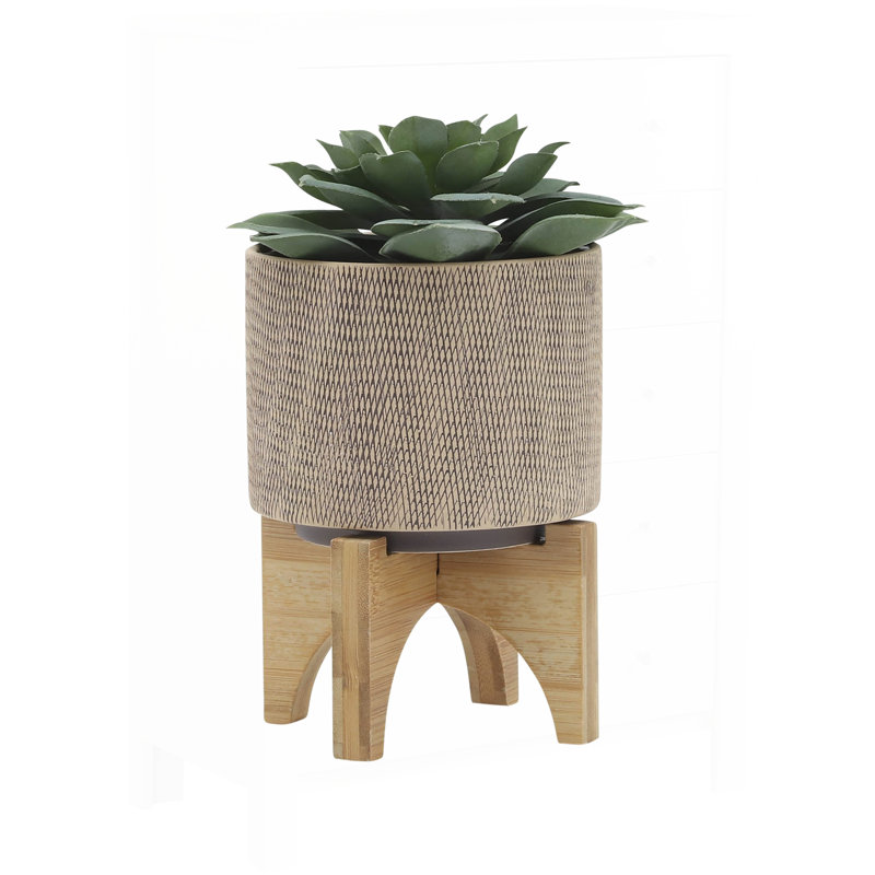 Stylish Tan Mesh Planter with Stand, Perfect for Indoor and Outdoor Decor, Enhances Any Space with Elegance and Functionality.