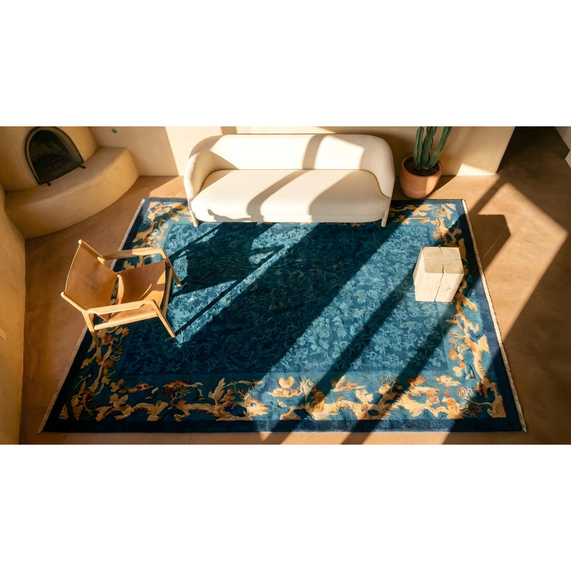 Tapis bleu antique en laine antique