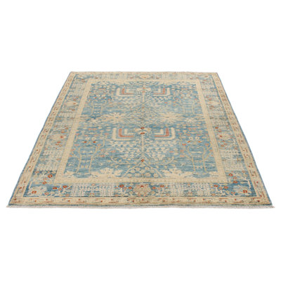 Tapis traditionnel bleu clair et ivoire 5 x 7