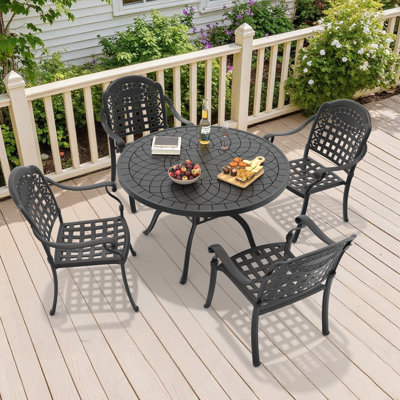 Ensemble de salle à manger rond pour patio 4 personnes 47,24 po avec 4 chaises empilables, coussins bleus