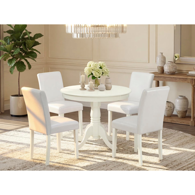 Ensemble de table de salle à manger 5 pièces comprenant une table de cuisine ronde avec piédestal et 4 chaises Parson revêtues de similicuir blanc, lin blanc