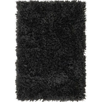 Tapis à poils longs en polyester tissé à la machine de couleur unie Burgy en noir onyx