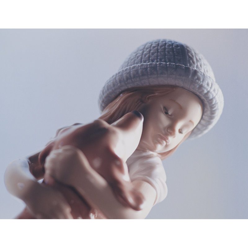 Eloquent Porcelain Family Figurine: Mother, Daughter, and Baby