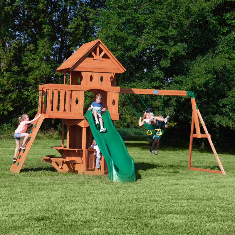 Backyard Discovery Woodland Cedar Wood Swing Set with Wave Slide, Clubhouse, Rock Wall, and Snack Bar Station