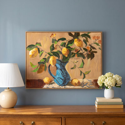 Lemon Branch in Blue Vase Framed Print