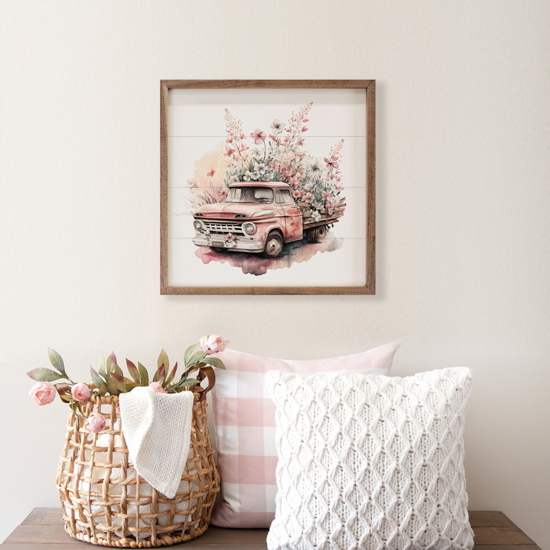 Camion rose avec fleurs plates, H 12 po x l 12 po