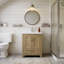 Meuble-lavabo Livorno de 24 po avec comptoir en céramique au fini noyer clair Red Barrel Studio®
