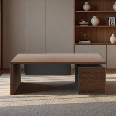 The boss's office desk is simple and has drawers