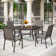 Basima 4 - Person Metal Patio Dining Set with Round Table