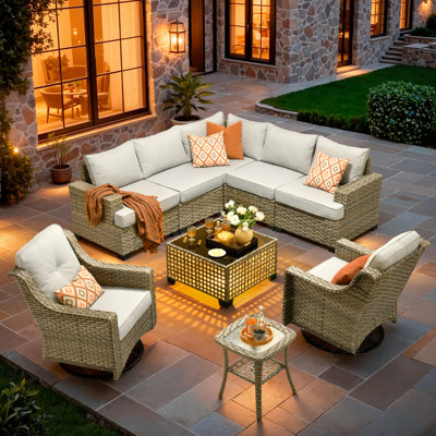 Ensemble de conversation d'extérieur modulaire réversible pour 7 personnes Wahkon, ensemble de conversation de patio en osier avec table basse éclairée, ensemble de chaises pivotantes toutes saisons avec coussins