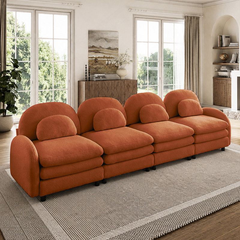Canapé modulaire à dossier incurvé avec coussins lombaires et coussins à double couche