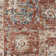 Alythia Machine Woven Polyester Area Rug in Red/Beige/Blue