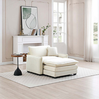 Canapé simple à assise profonde avec repose-pieds et coussin