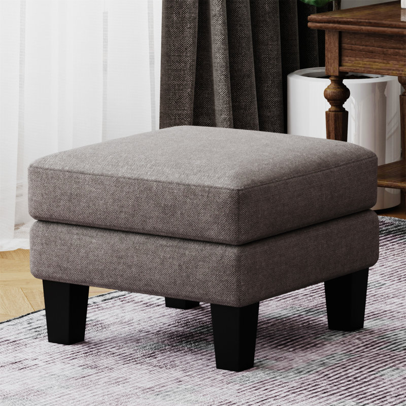 Repose-pieds en tissu gris clair