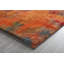 Tapis orange touffeté à la main