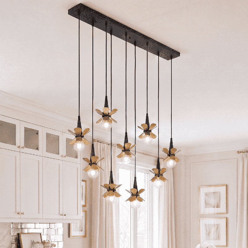 Portinatx 9-Light Linear Chandelier in Satin Black with Hammered Gold by Breegan Jane