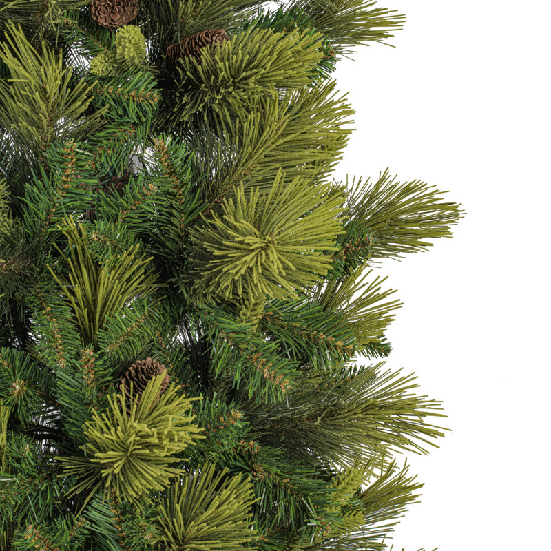 Sapin de Noël artificiel en mélange 6,5 pi x 30 po avec 862 pointes de sapin mélangées réalistes et un support en métal pliable. Assemblage requis.