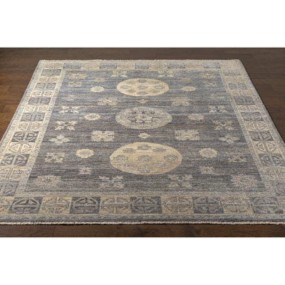 Tomekia Area Rug