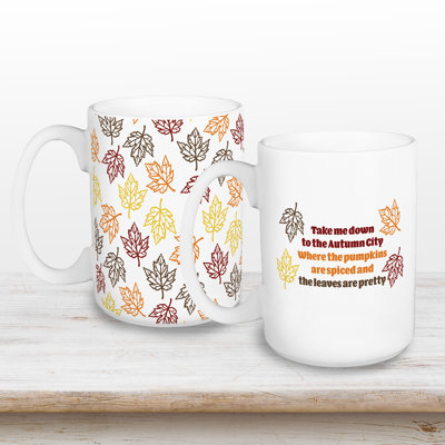 Les citrouilles sont épicées et les feuilles sont un joli ensemble de 2 tasses à café