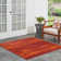 Pentworth Machine Woven Chenille Indoor/Outdoor Area Rug in Red