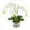 Orchid Floral Arrangement In Decorative Vase With Leaves And Bamboo