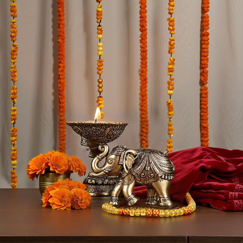 Lampe à huile éléphant Diya en laiton ciselée à la main