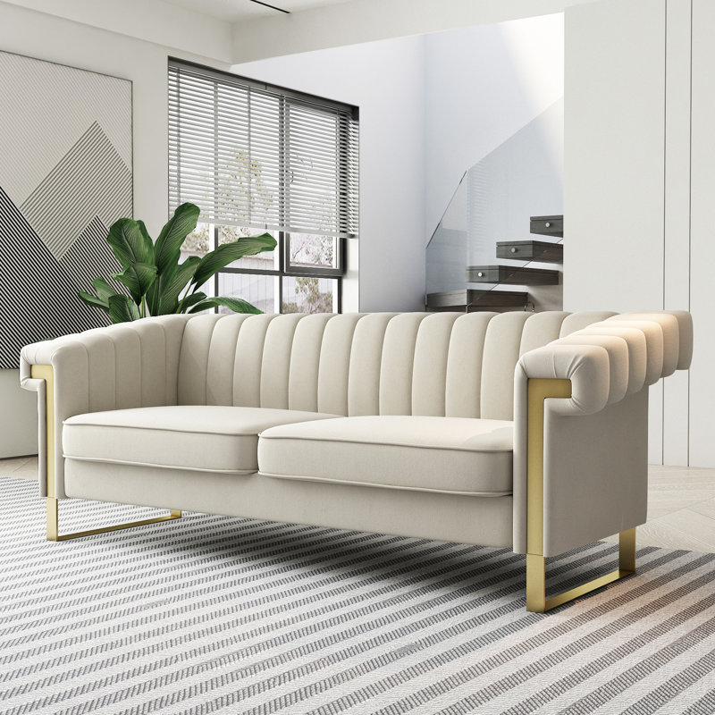 Canapé moderne en velours crème à 3 accents dorés pour un salon de style chambre à coucher doré