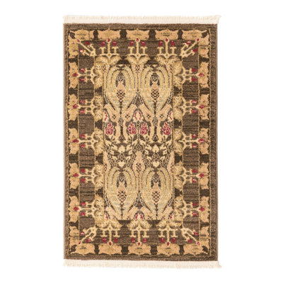 Moore Ikat Brown Area Rug