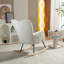 Chaise berçante en tissu avec repose-pieds Teddy-472144125