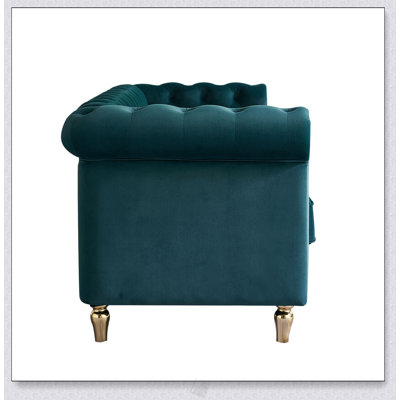 Canapé Chesterfield en velours avec capitonnage à boutons profonds et design élégant pour des sièges confortables