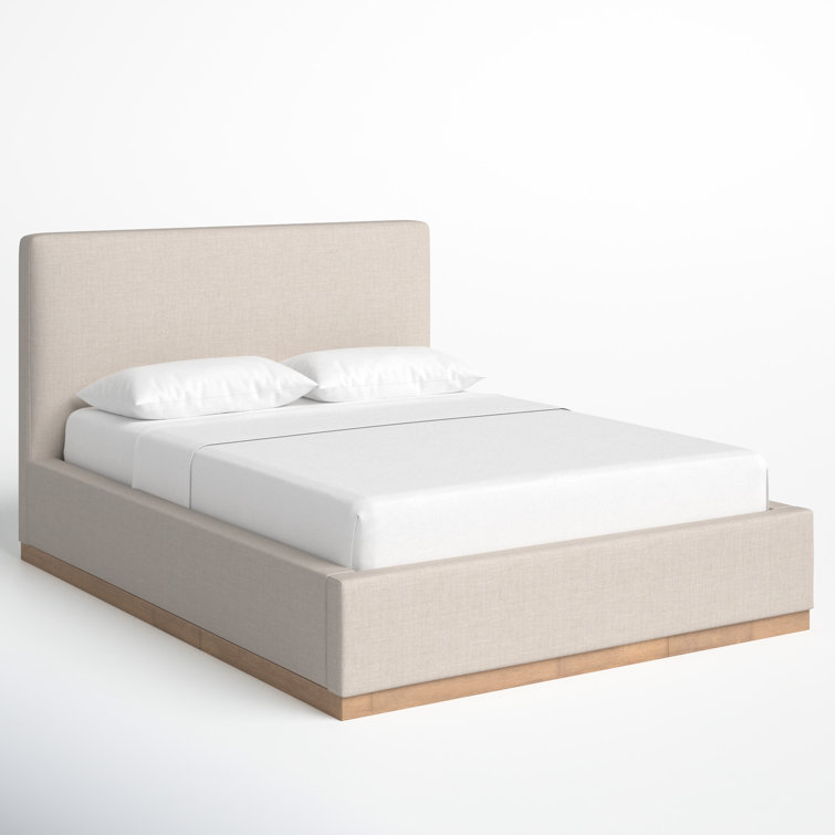 Delpha Grounded Upholstered Wood Base Bed