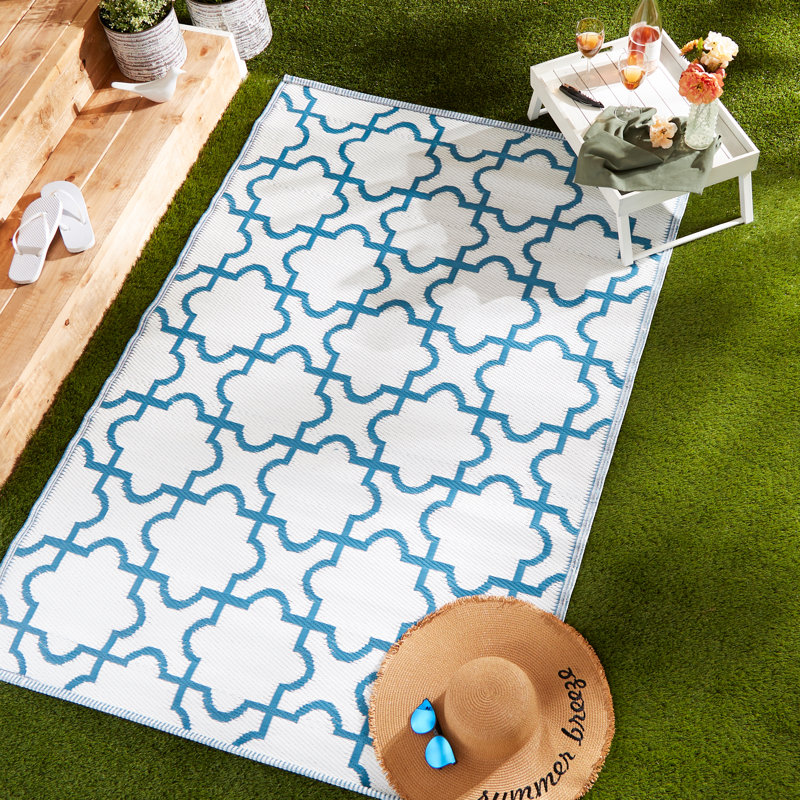 Tapis d'extérieur à treillis bleu et blanc Drusilla